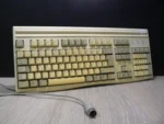 Mitsumi DIN Billentyűzet Magyar Windows logo